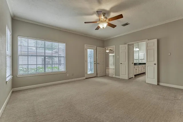 a bathroom with double sink and shower