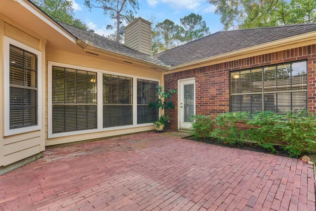 a picture of a bathroom with a sink and mirror