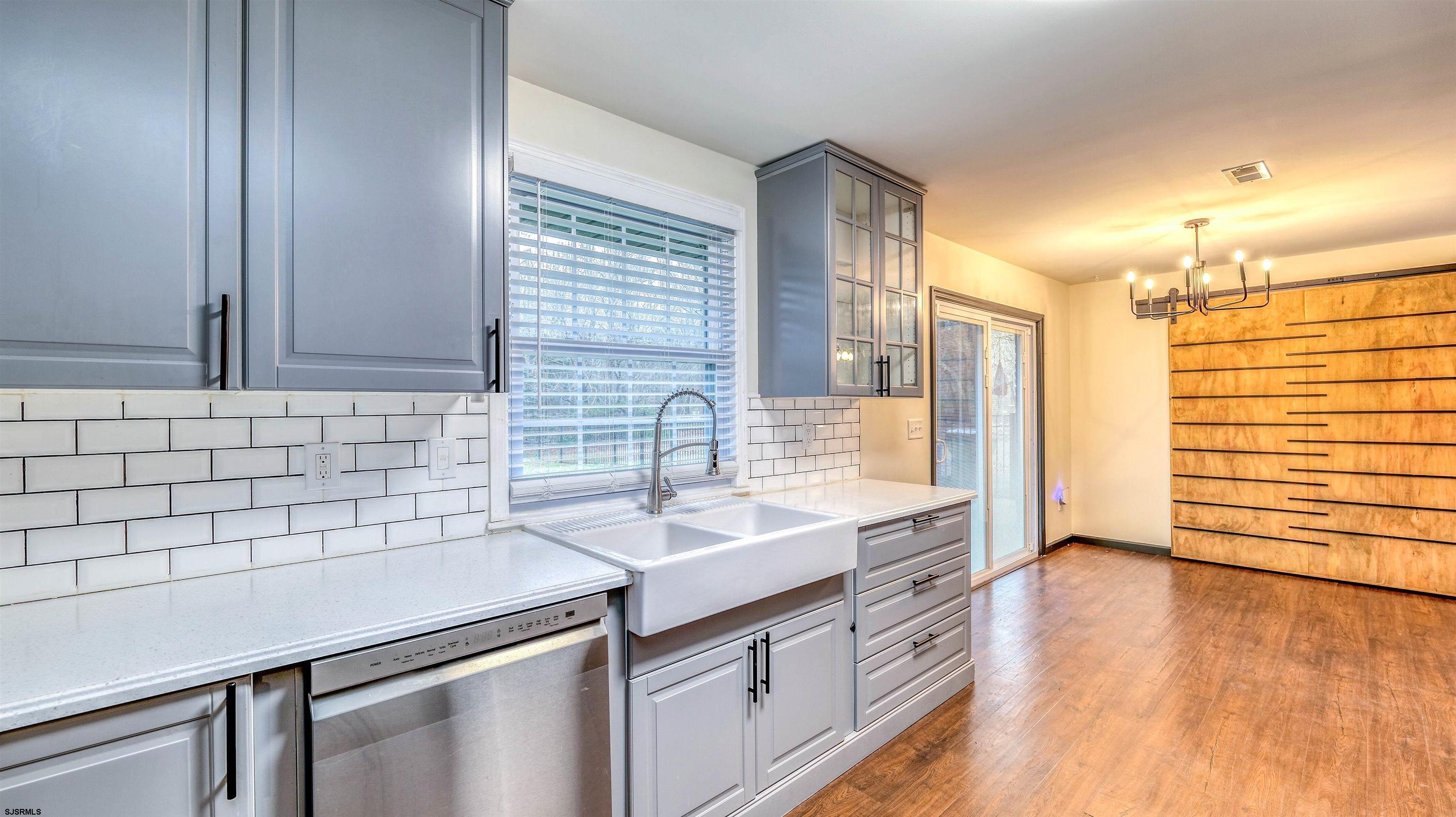 1048 Ocean Heights Avenue Egg Harbor Township, NJ 08234 - Photo 12 of 30 a kitchen with a sink and cabinets