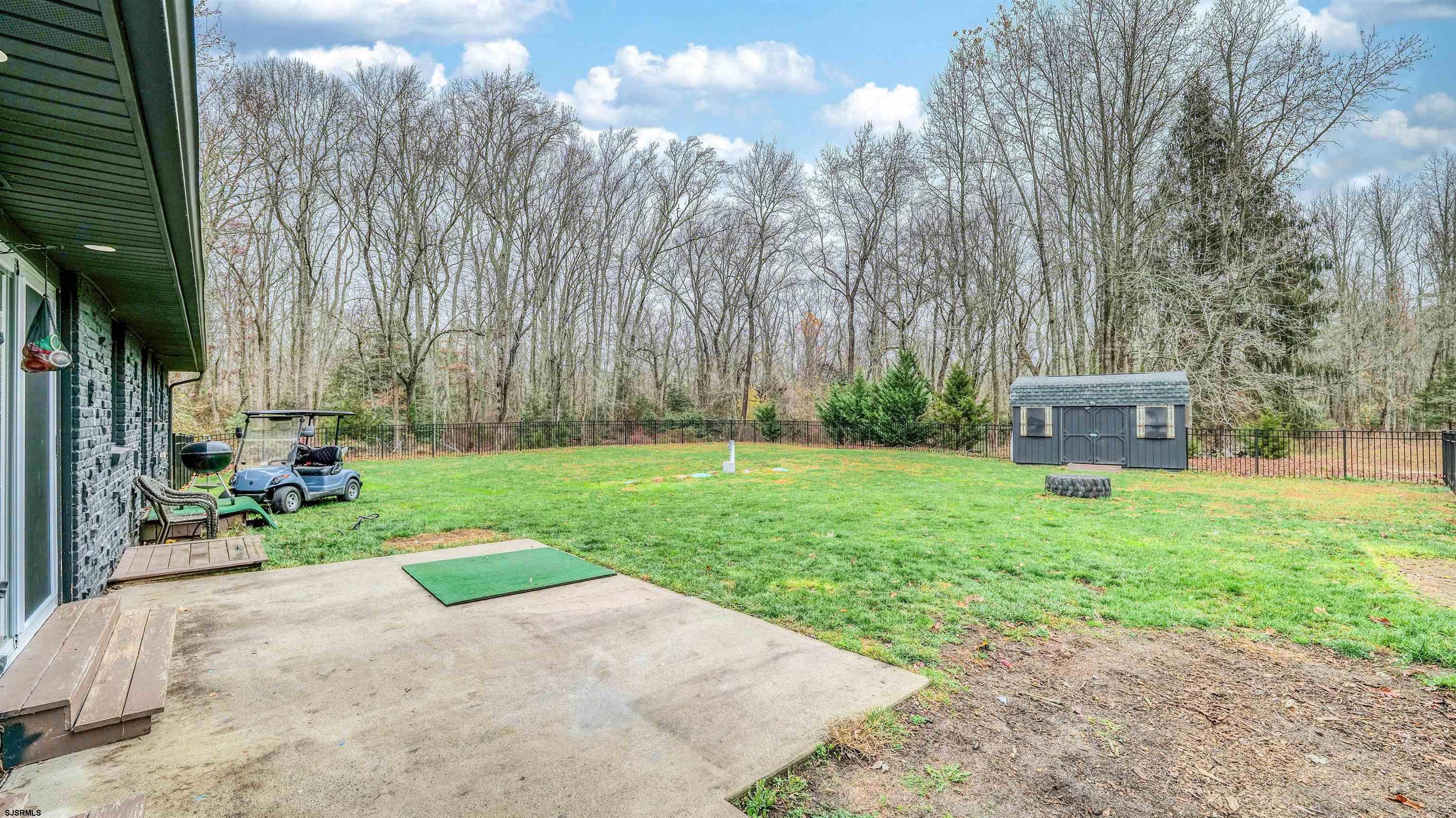 1048 Ocean Heights Avenue Egg Harbor Township, NJ 08234 - Photo 26 of 30 a view of a back yard