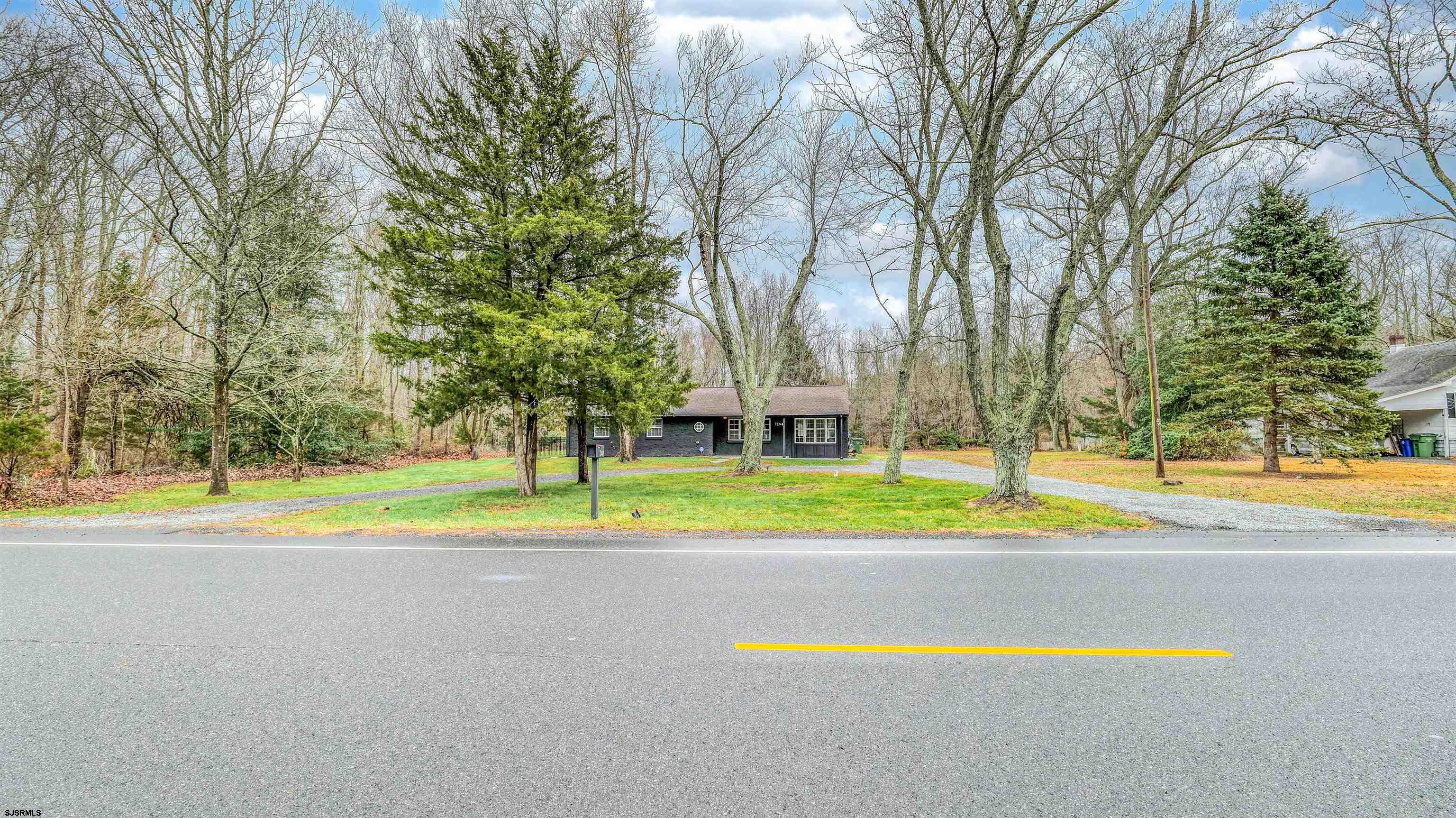 1048 Ocean Heights Avenue Egg Harbor Township, NJ 08234 - Photo 29 of 30 a view of pool and trees