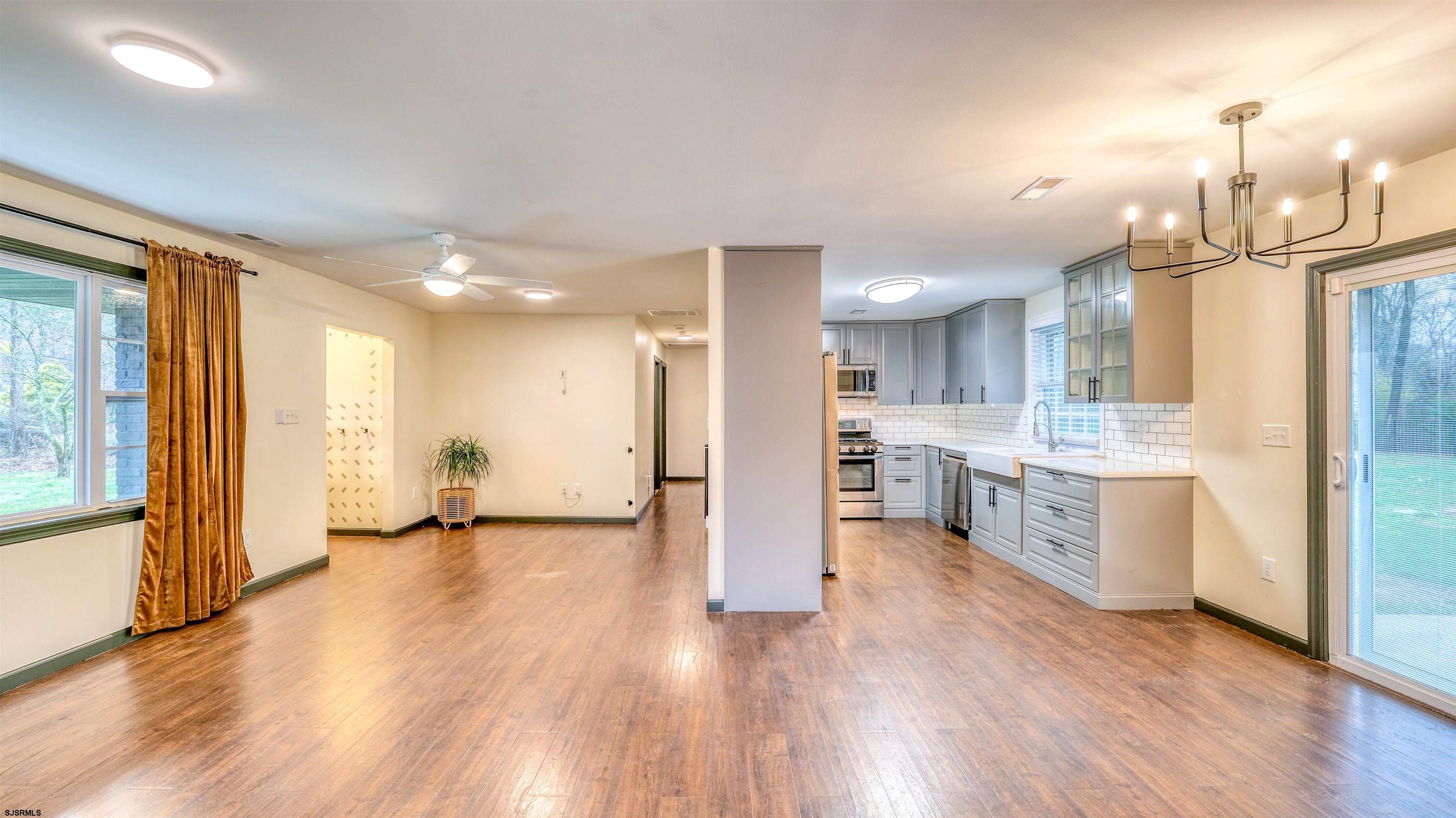 1048 Ocean Heights Avenue Egg Harbor Township, NJ 08234 - Photo 8 of 30 a view of a kitchen with a sink a refrigerator and a stove