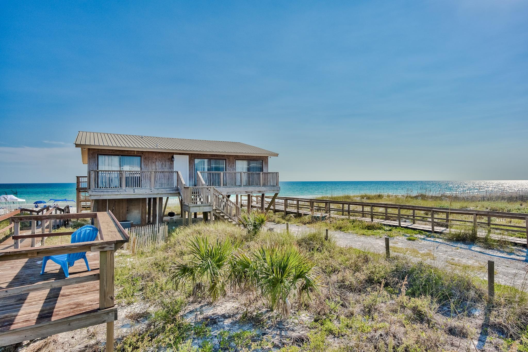5357 West County Highway 30A Santa Rosa Beach, FL 32459 - Photo 1 of 22 a view of a house with outdoor space and sitting area