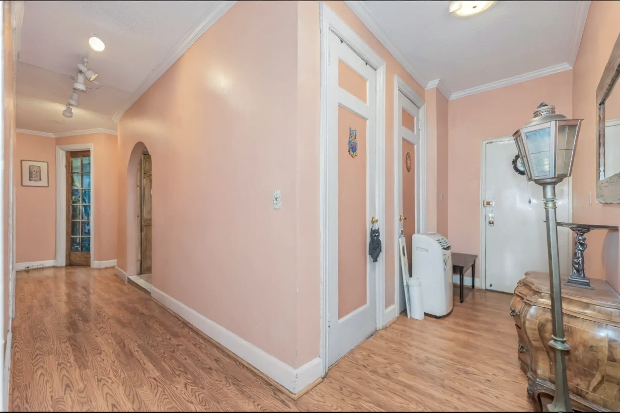15 Fort Washington Avenue, Unit 3A Manhattan, NY 10032 - Photo 7 of 15 a view of a room with wooden floor and chair