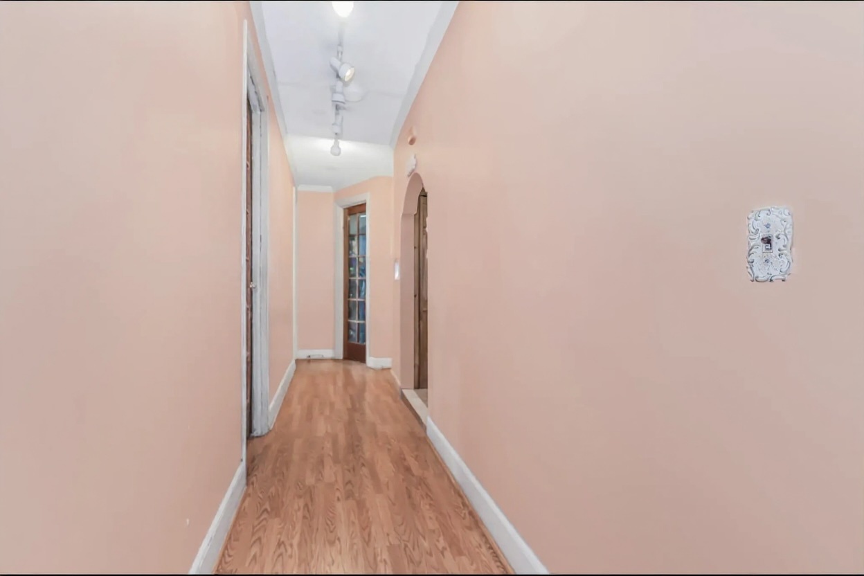 15 Fort Washington Avenue, Unit 3A Manhattan, NY 10032 - Photo 8 of 15 a view of a hallway with wooden floor