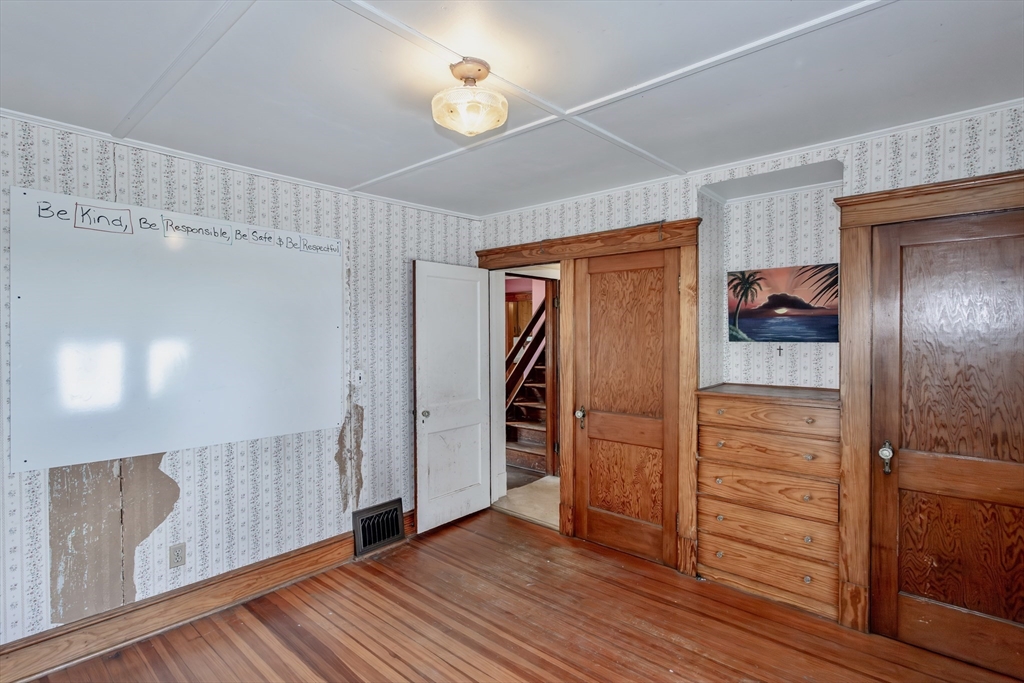 94 Holyoke Road Westfield, MA 01085 - Photo 25 of 42 a view of walk in closet with wooden floor