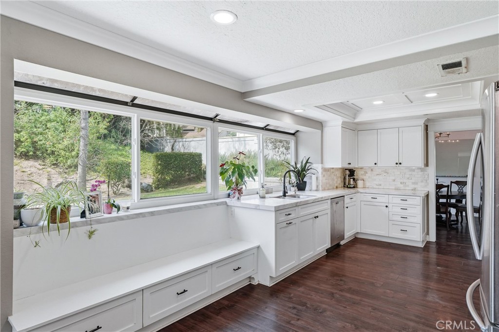 282 North Willow Springs Road Orange, CA 92869 - Photo 15 of 43 a kitchen with sink and cabinets