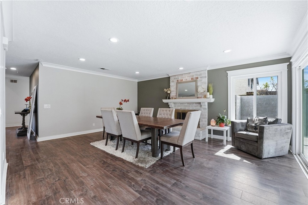 282 North Willow Springs Road Orange, CA 92869 - Photo 17 of 43 a view of a dining room with furniture window and wooden floor