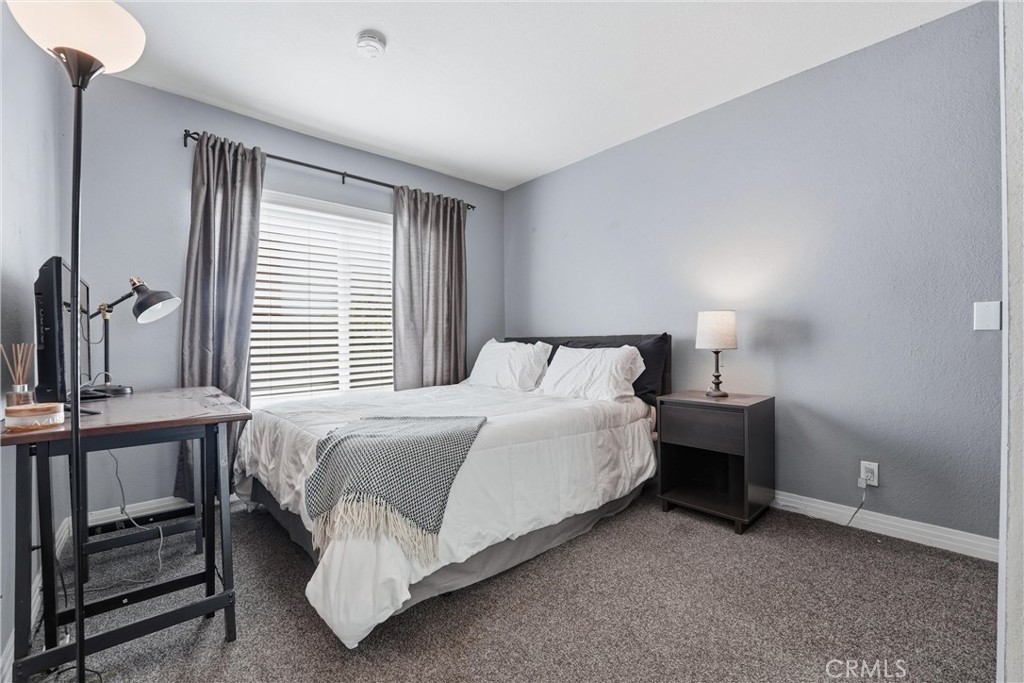282 North Willow Springs Road Orange, CA 92869 - Photo 20 of 43 a bedroom with a bed and a window