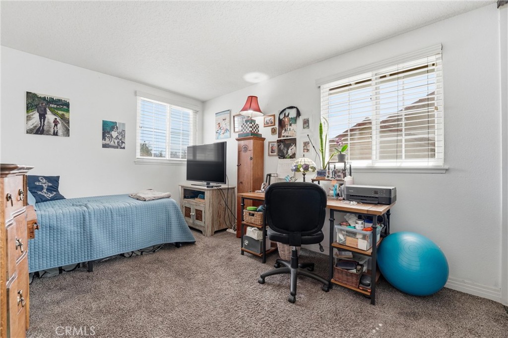282 North Willow Springs Road Orange, CA 92869 - Photo 27 of 43 a view of a workspace with furniture and a window