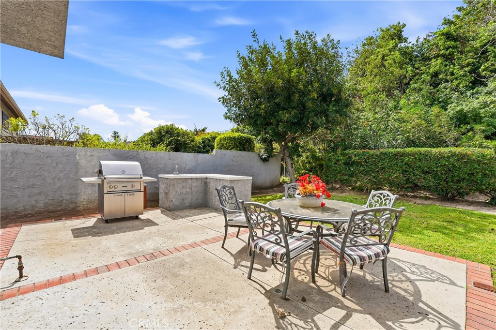 282 North Willow Springs Road Orange, CA 92869 - Photo 30 of 43 a view of a chairs and table in the patio