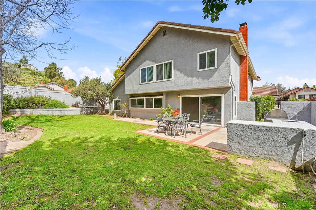 282 North Willow Springs Road Orange, CA 92869 - Photo 32 of 43 a front view of house with yard and seating space