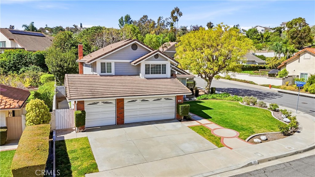 282 North Willow Springs Road Orange, CA 92869 - Photo 36 of 43 front view of a house with a yard