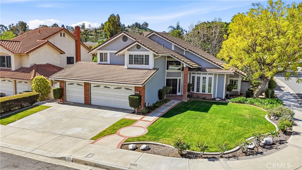 282 North Willow Springs Road Orange, CA 92869 - Photo 38 of 43 a view of a house with a yard and sitting area