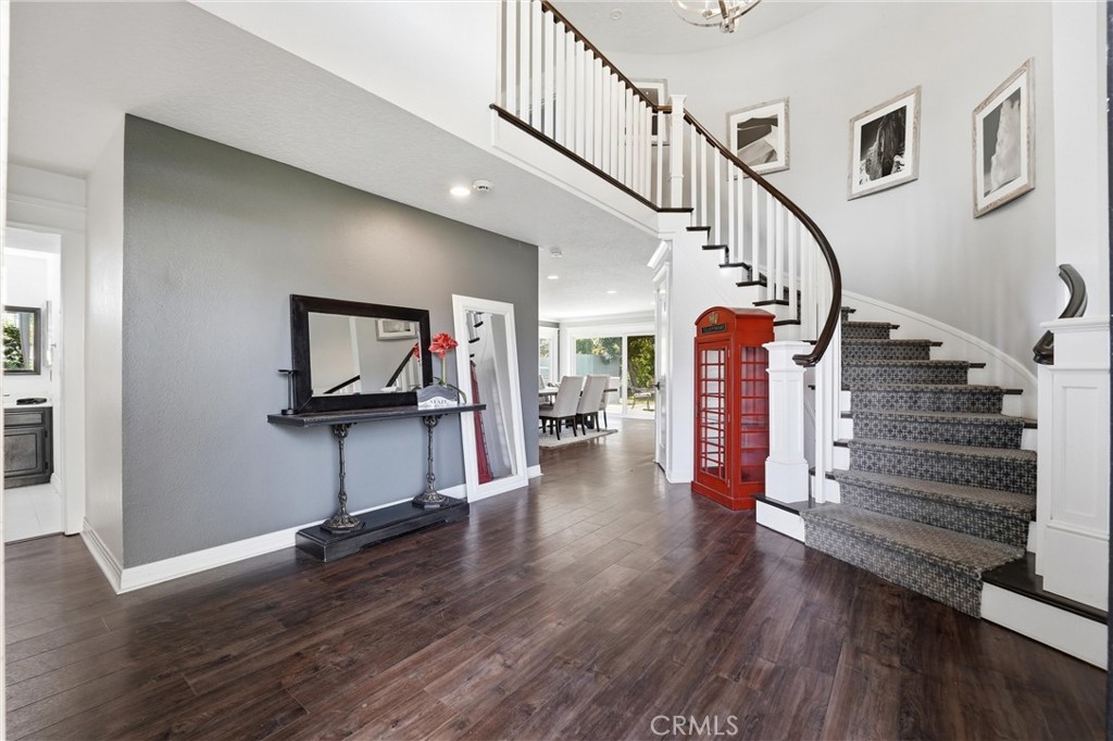 282 North Willow Springs Road Orange, CA 92869 - Photo 5 of 43 a view of entryway with wooden floor and stairs