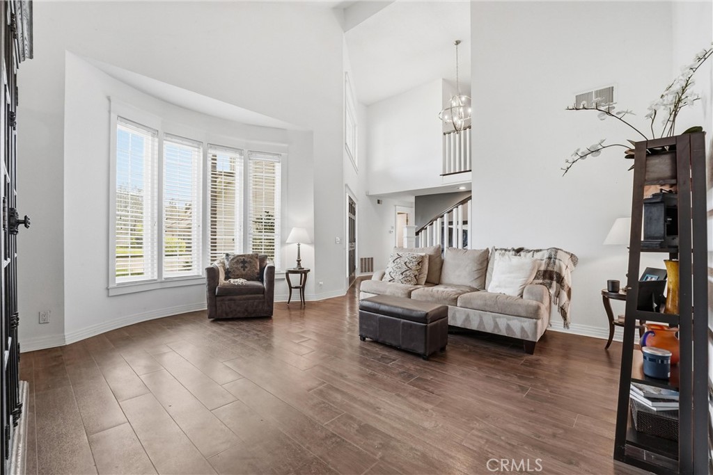 282 North Willow Springs Road Orange, CA 92869 - Photo 8 of 43 a living room with furniture and a large window