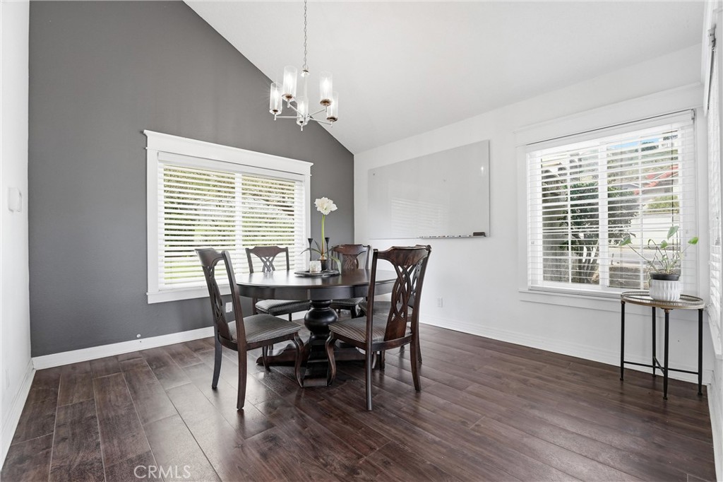 282 North Willow Springs Road Orange, CA 92869 - Photo 9 of 43 a view of a dining room with furniture windows and wooden floor