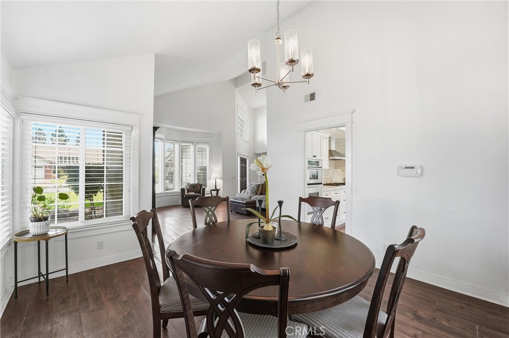 282 North Willow Springs Road Orange, CA 92869 - Photo 10 of 43 a view of a dining room with furniture window and wooden floor
