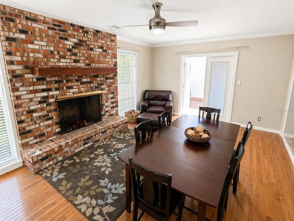 2313 Southeast 7th Street Ocala, FL 34471 - Photo 17 of 54 a view of a dining room with furniture and chandelier