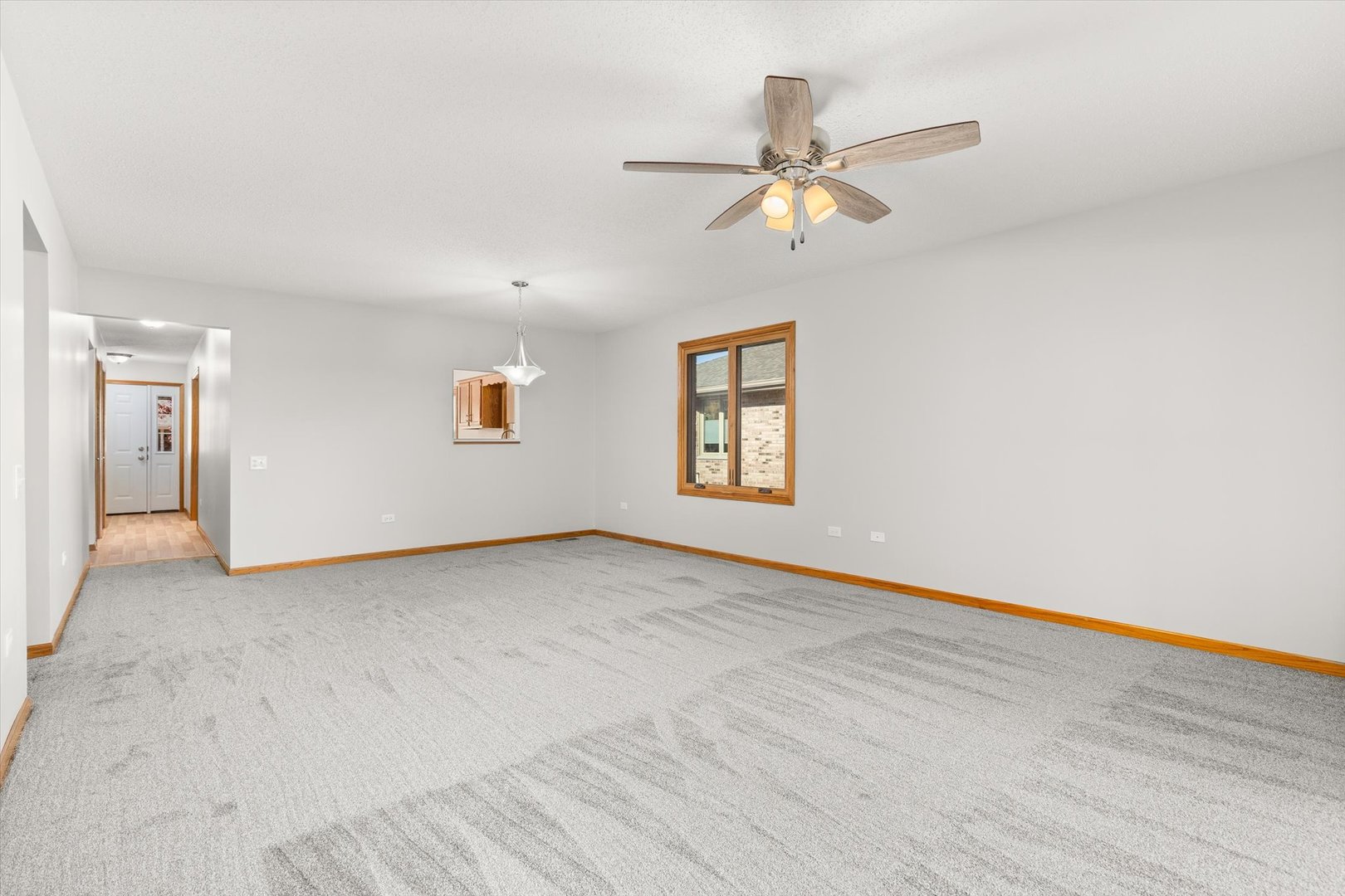 822 Eagle Creek Road Elwood, IL 60421 - Photo 15 of 41 an empty room with windows and fan