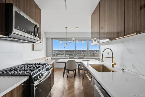 a kitchen with a stove and a microwave