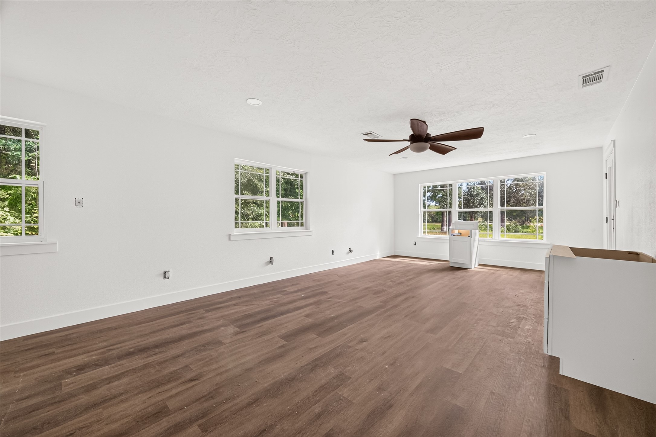 6222 Farm To Market 1010 Road Cleveland, TX 77327 - Photo 8 of 34 Bright living room with new wood-look flooring