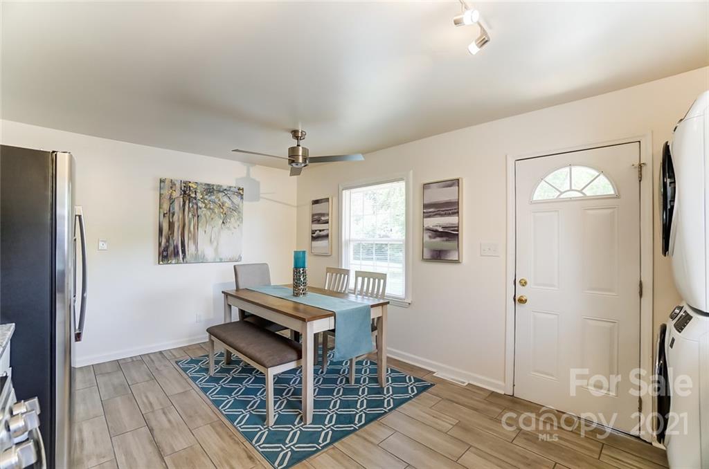 4033 Fieldcrest Road Charlotte, NC 28217 - Photo 7 of 17 a living room with furniture and a rug