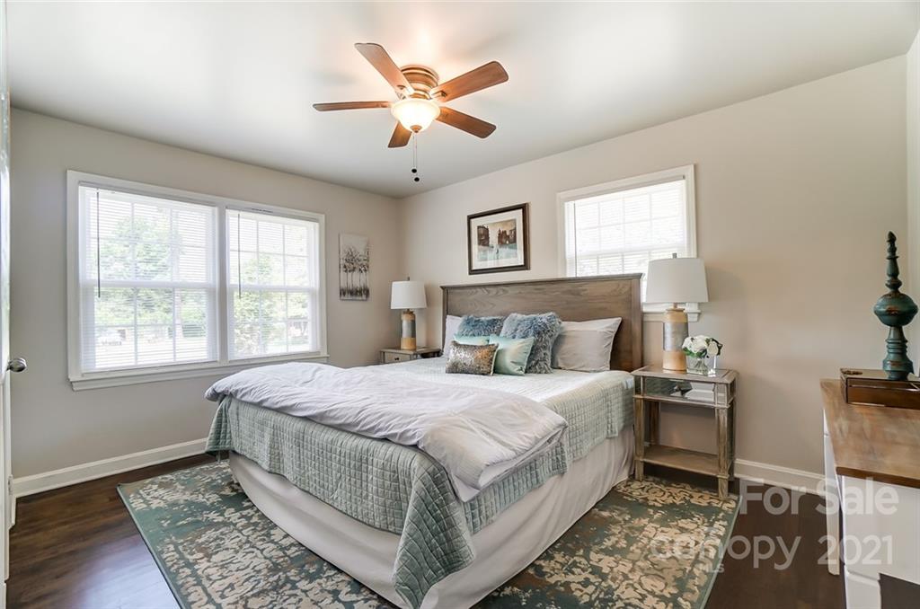 4033 Fieldcrest Road Charlotte, NC 28217 - Photo 9 of 17 a bedroom with a large bed and a window