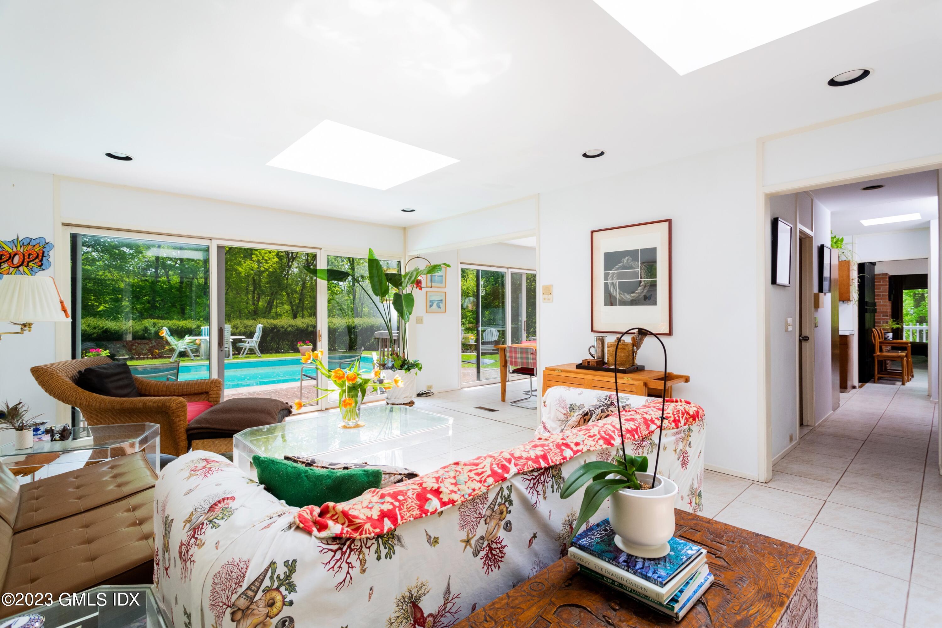 140 Round Hill Road Greenwich, CT 06831 - Photo 24 of 49 a view of a dining room with furniture window and outside view