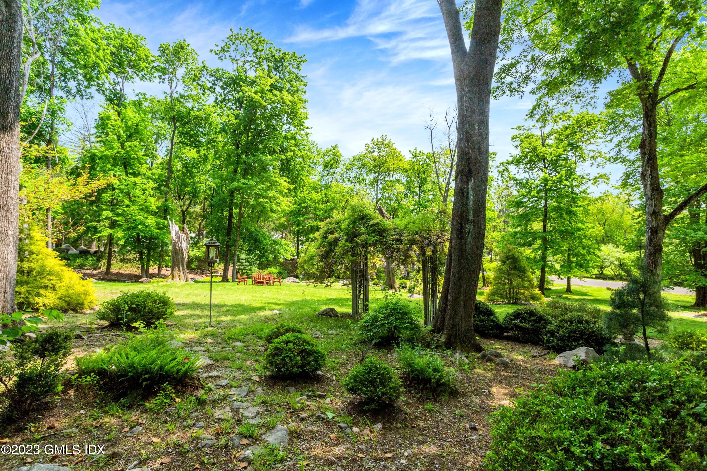 140 Round Hill Road Greenwich, CT 06831 - Photo 35 of 49 a view of yard with green space