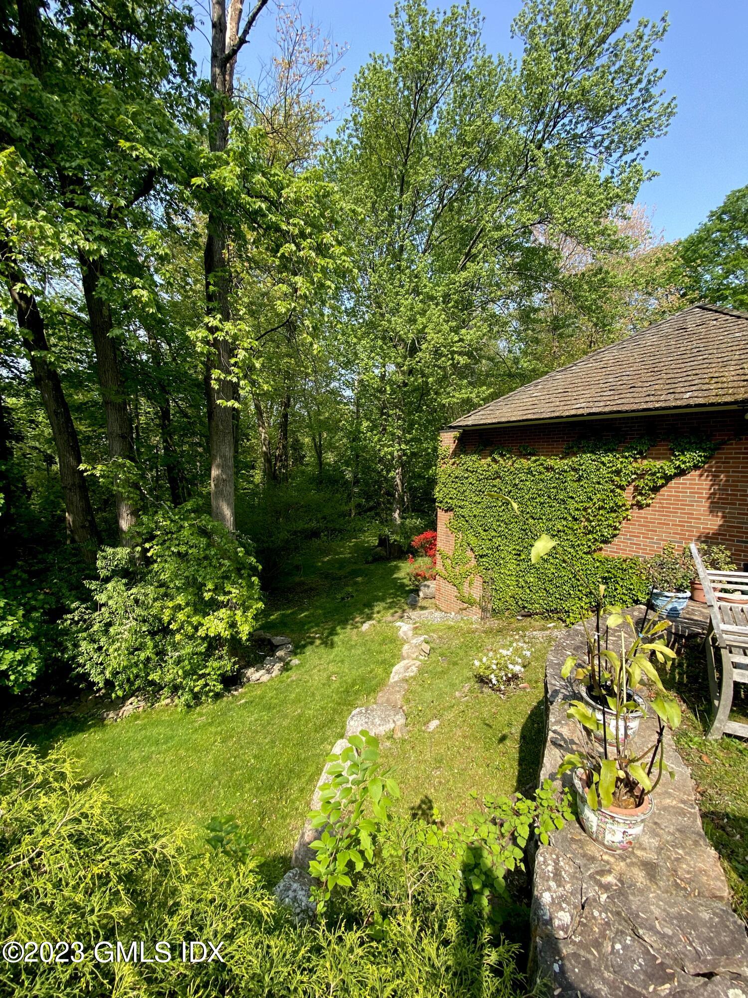 140 Round Hill Road Greenwich, CT 06831 - Photo 37 of 49 a view of an outdoor space