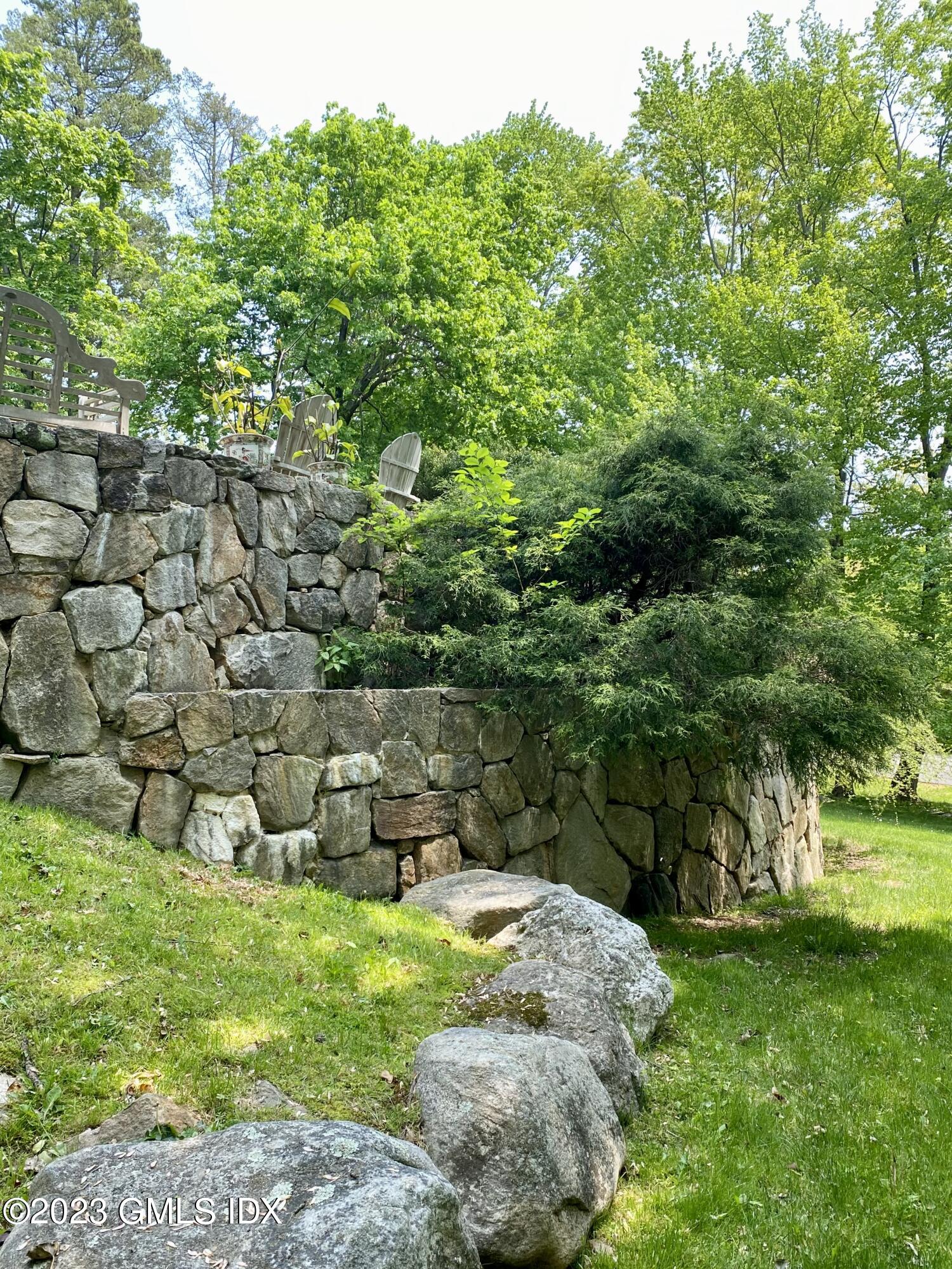 140 Round Hill Road Greenwich, CT 06831 - Photo 40 of 49 a view of yard with green space
