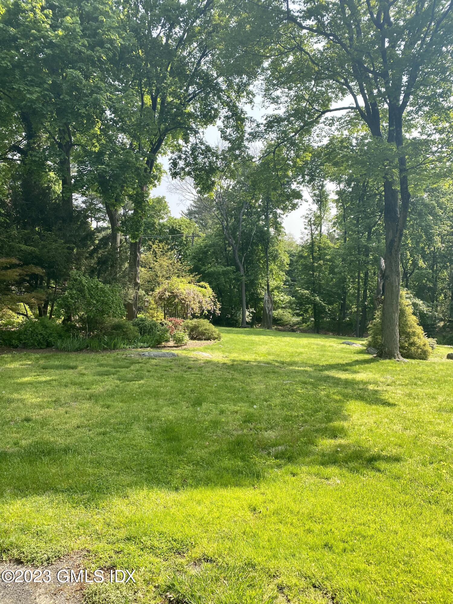 140 Round Hill Road Greenwich, CT 06831 - Photo 43 of 49 a view of outdoor space and yard