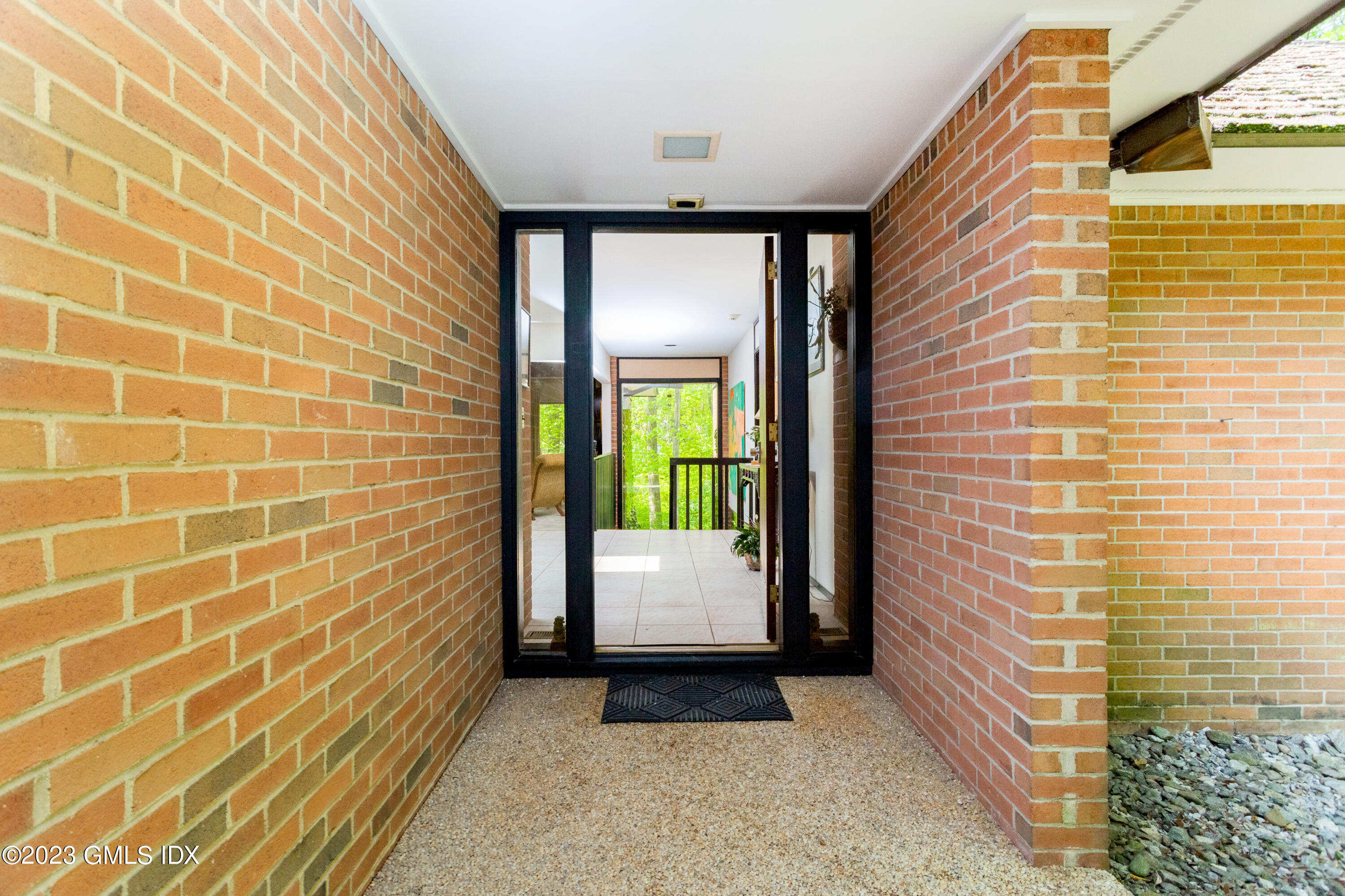 140 Round Hill Road Greenwich, CT 06831 - Photo 7 of 49 a view of a door and wooden floor