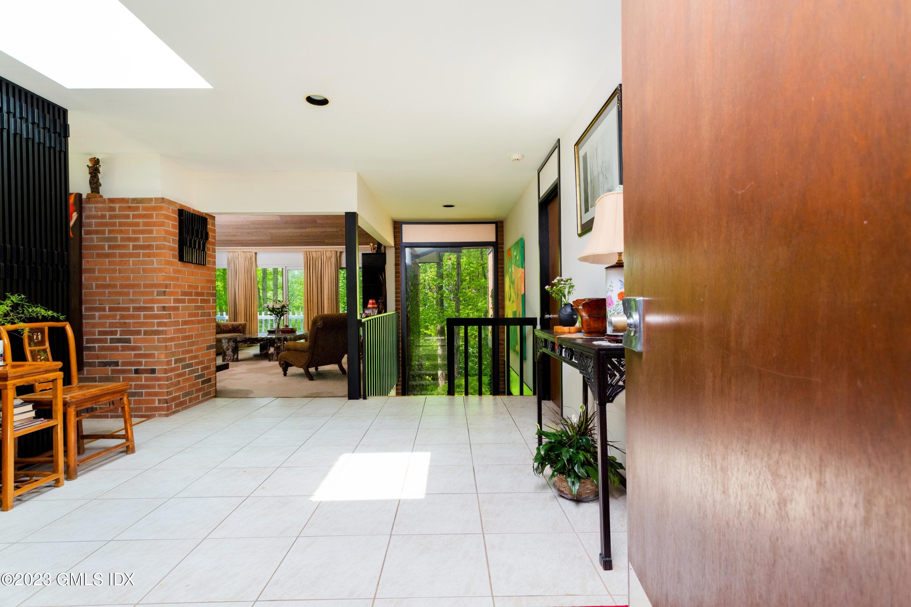 140 Round Hill Road Greenwich, CT 06831 - Photo 8 of 49 a view of livingroom with furniture and entryway