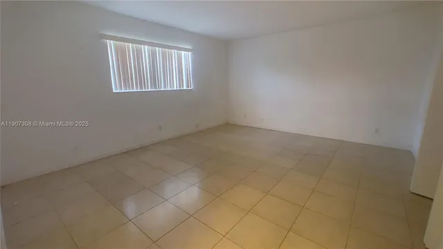 a stove top oven sitting inside of a kitchen