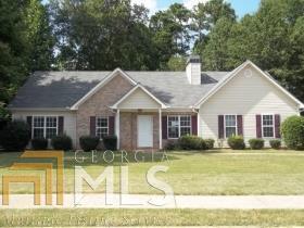 190 Pecan Ridge Drive Fayetteville, GA 30215 - Photo 1 of 1 a front view of house with yard and green space
