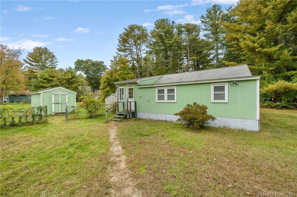 11 Pine Tree Road East Haddam, CT 06469 - Photo 1 of 1 a view of a house with a yard