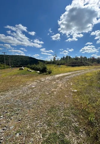 a view of an ocean and sunset