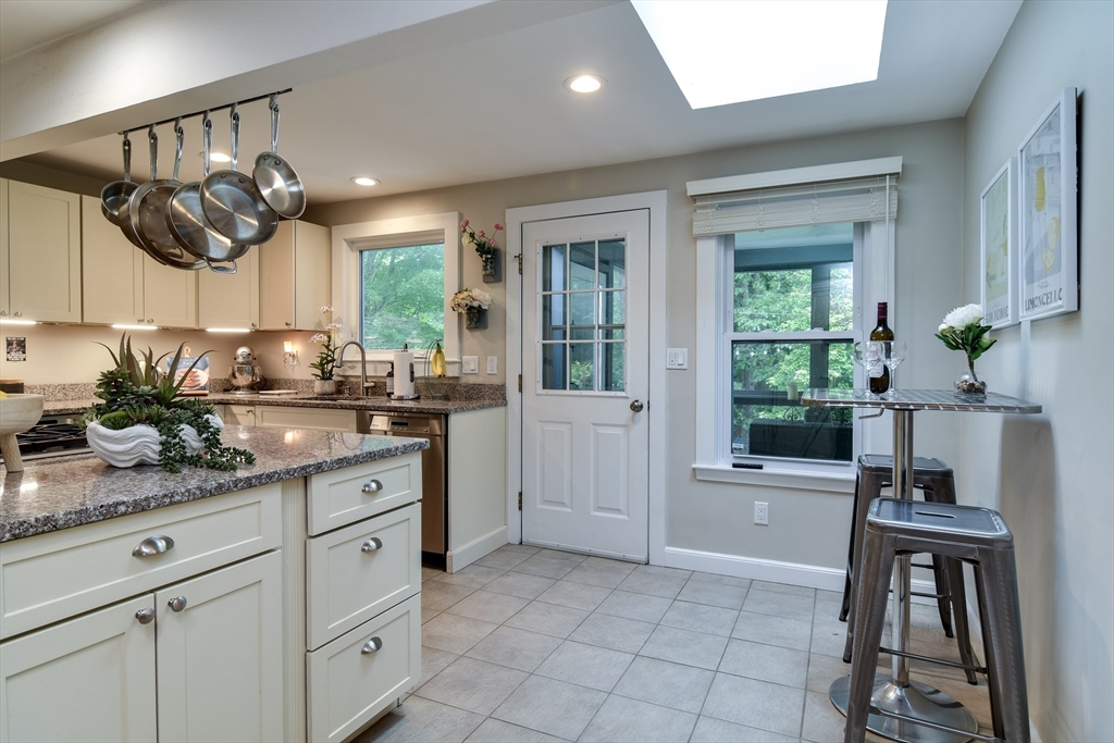 76 Pleasant Street South Natick, MA 01760 - Photo 11 of 36 a kitchen with cabinets and window