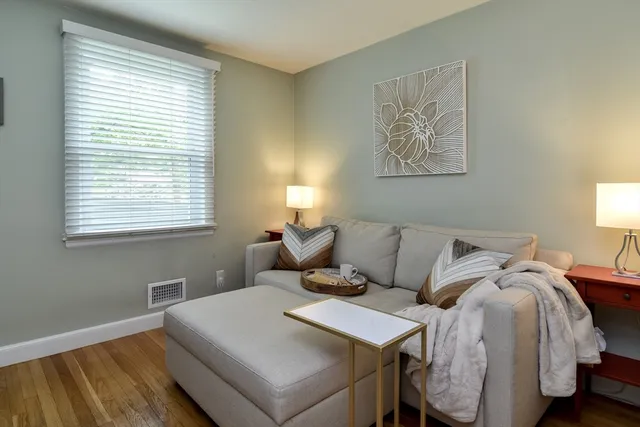 a bed room with a bed and a window