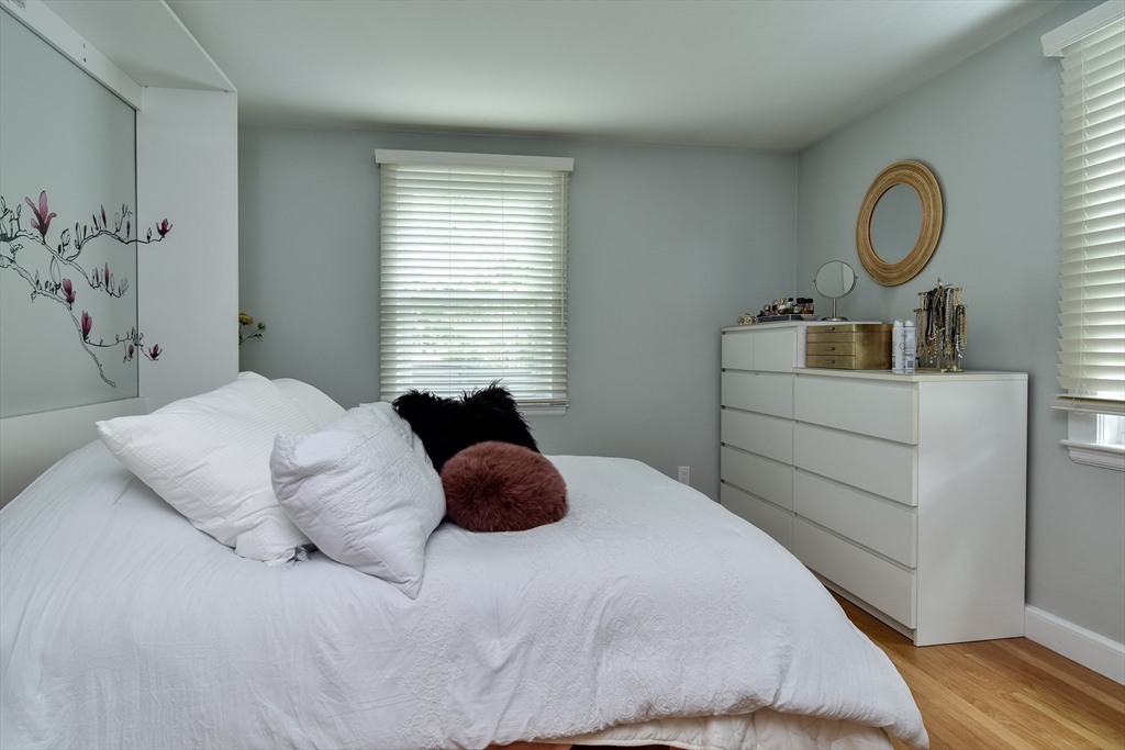 76 Pleasant Street South Natick, MA 01760 - Photo 17 of 36 a bedroom with a bed and a dresser