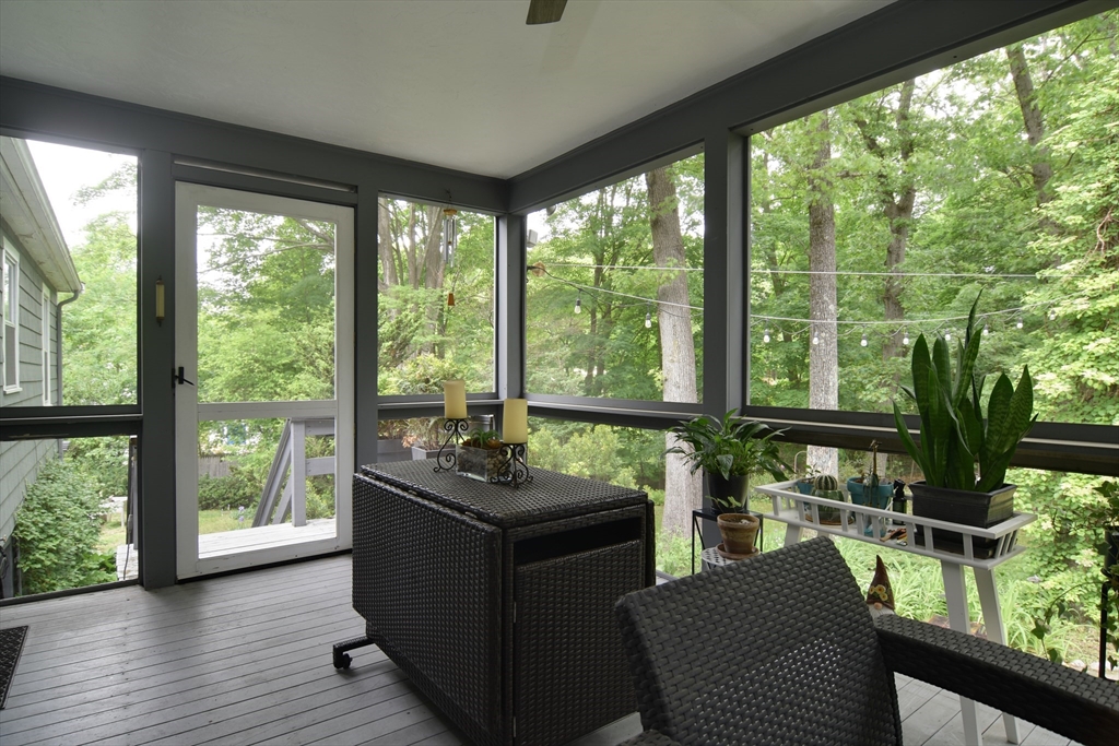 76 Pleasant Street South Natick, MA 01760 - Photo 33 of 36 a room with furniture and large windows