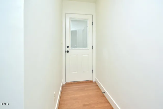 a view of hallway with closet