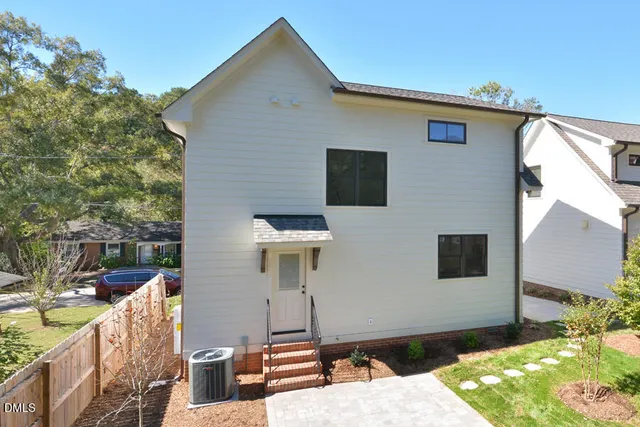 a backyard of a house with seating space
