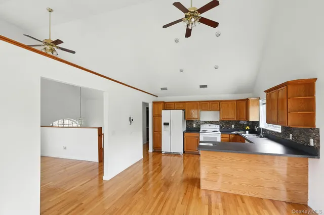 a view of a living room and dining room