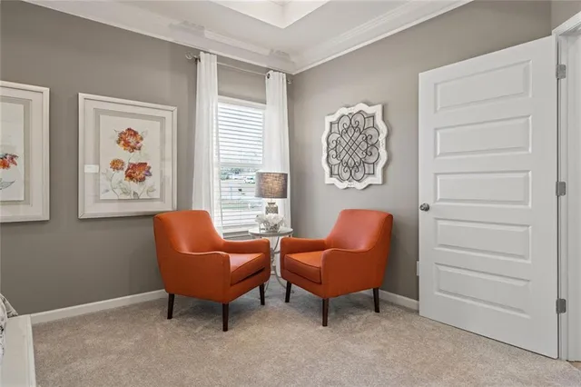 a room with furniture and a window