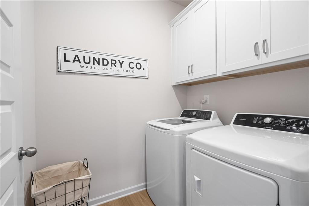 23 Willow Circle Rock Spring, GA 30739 - Photo 10 of 33 a utility room with dryer and washer