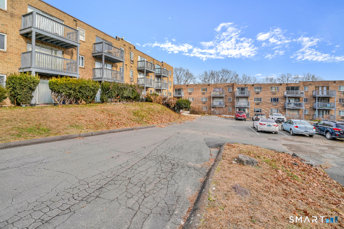 279 Oakville Avenue, Unit B12 Waterbury, CT 06708 - Photo 7 of 8 a city view with tall buildings