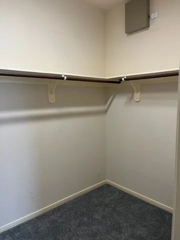 a view of small space with racks on the wall